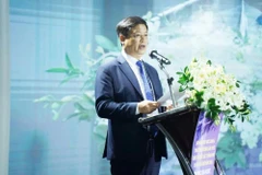 El vicepresidente permanente del Comité Popular municipal, Nguyen Thanh Binh, habla en la cita (Fuente: VNA)