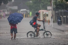 Inundaciones en Quezón, Filipinas, tras las fuertes lluvias provocadas por el tifón Wipha. (Foto: Xinhua)