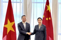 El embajador de Vietnam en Beijing, Pham Thanh Binh y la ministra de Justicia de China, He Rong (Fuente: VNA)