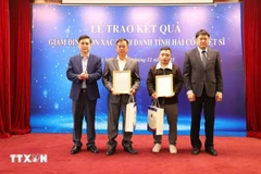 Presentan resultados de las pruebas de ADN de los restos de los soldados caídos a sus familiares. (Foto: VNA)