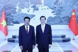 El presidente de la Fiscalía Popular Suprema de Vietnam, Nguyen Huy Tien (izquierda) y su par chino Ying Yong (Fuente: VNA)