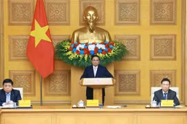 El primer ministro Pham Minh Chinh sostiene el diálogo con empresas chinas (Fuente: VNA)