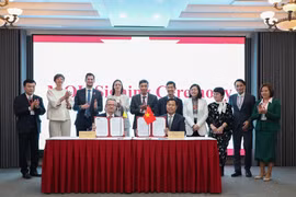 La UNH firma acuerdos de cooperación con sus socios. (Foto: qdnd.vn)