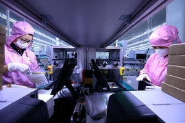 En la empresa de Toyo Solar, fabricante de paneles solares en el Parque Industrial Cam Khe en la provincia de Phu Tho. Foto: VNA