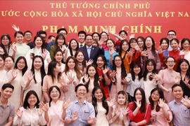 El primer ministro vietnamita, Pham Minh Chinh, sostiene un encuentro con representantes de la comunidad vietnamita en las regiones chinas de Beijing, Tianjin y Hebei (Fuente: VNA)