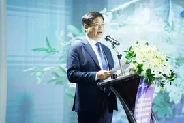 El vicepresidente permanente del Comité Popular municipal, Nguyen Thanh Binh, habla en la cita (Fuente: VNA)