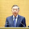 El secretario general del Partido y presidente de Vietnam, To Lam, preside la Conferencia Nacional sobre el desarrollo de la economía con inversión extranjera. (Foto: VNA)