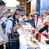 Presentan café de Yunan en festival de café de la Montaña Nevada del Dragón de Jade en el antiguo pueblo de Baisha, China. (Foto: VNA)