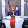 Primeros ministros de Vietnam, Laos y Camboya sostienen desayuno de trabajo. (Foto: VNA)