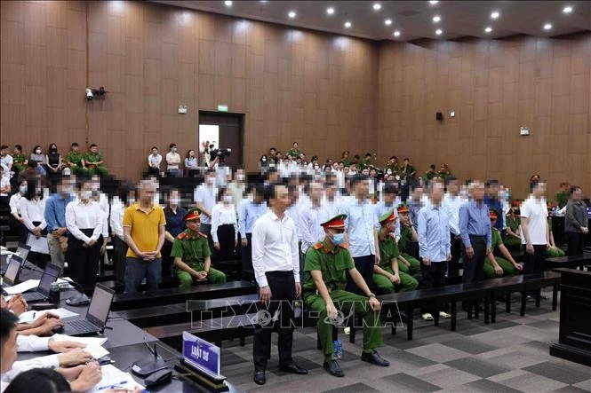 Los acusados ​​en el juicio. (Foto: VNA)
