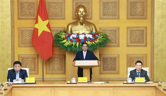 El primer ministro Pham Minh Chinh sostiene el diálogo con empresas chinas (Fuente: VNA)