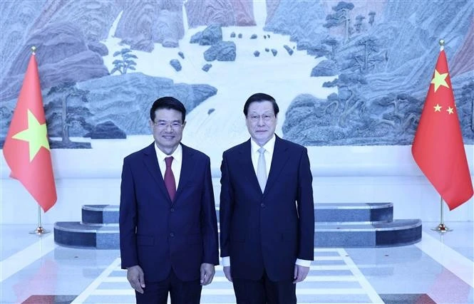 El presidente de la Fiscalía Popular Suprema de Vietnam, Nguyen Huy Tien (izquierda) y su par chino Ying Yong (Fuente: VNA)