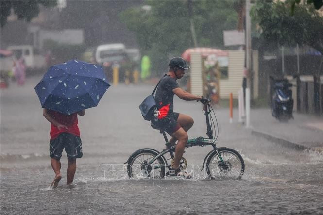 Inundaciones en Quezón, Filipinas, tras las fuertes lluvias provocadas por el tifón Wipha. (Foto: Xinhua)
