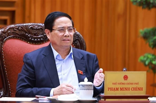 El primer ministro de Vietnam, Pham Minh Chinh, preside la reunión (Fuente: VNA)