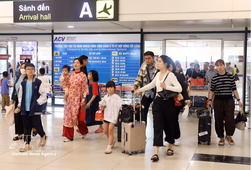 Pasajeros en el aeropuerto de Noi Bai. Foto: VNA