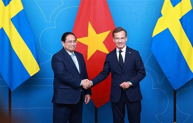 El primer ministro vietnamita, Pham Minh Chinh, y su homólogo sueco, Ulf Kristersson (Fuente: VNA)
