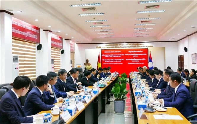 Hanoi y Vientiane refuerzan cooperación bilateral. (Foto: VNA)