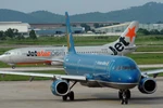 Reprograman aerolíneas vietnamitas vuelos nacionales por tifón Matmo 