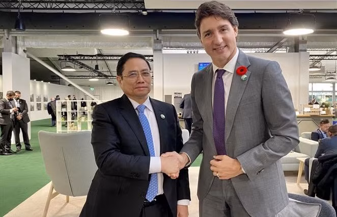Premier vietnamita se reúne con dirigentes de Canadá y Zambia ảnh 1