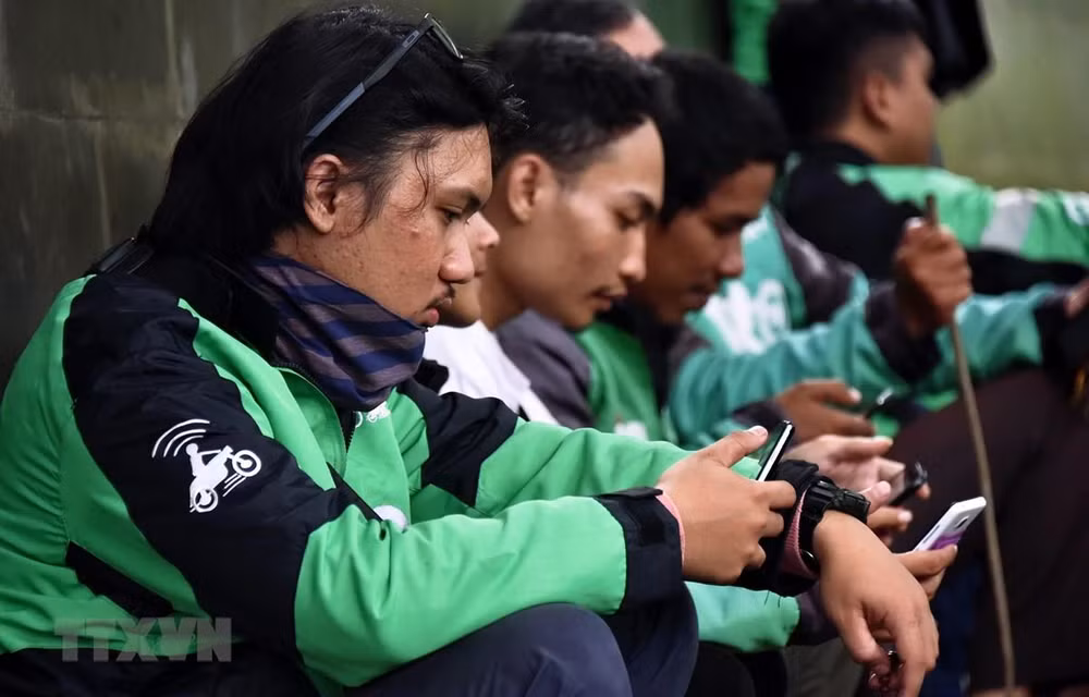 Impone Malasia multa por 20 millones de dólares a la compañía transportista Grab ảnh 1