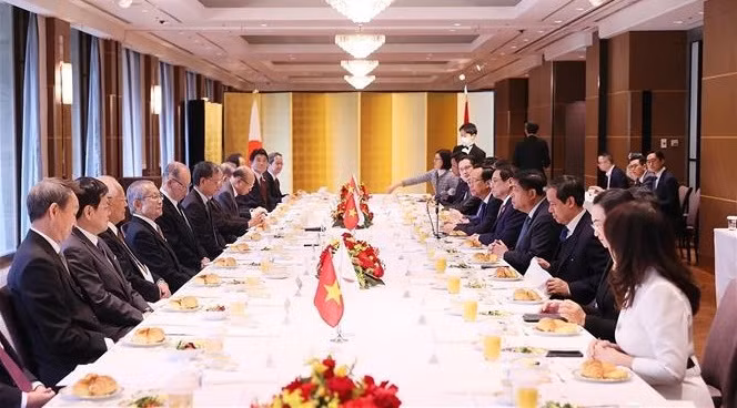 Premier vietnamita recibe a titulares de FEC y JICA ảnh 2