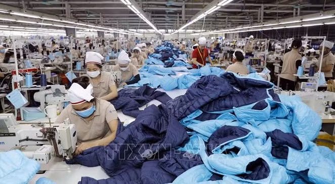 Exportación contribuye de manera importante a promover desarrollo económico vietnamita ảnh 1