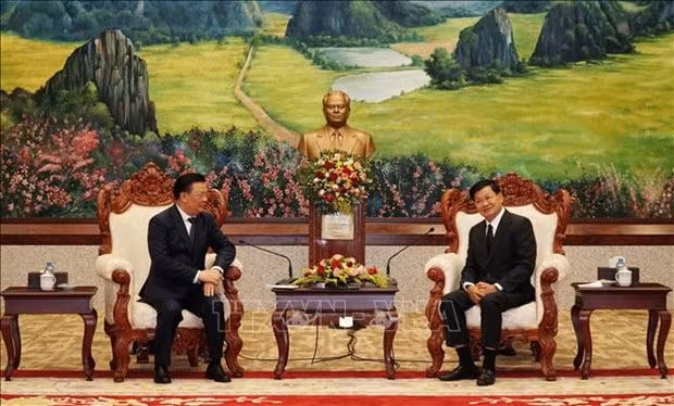 Valoran fructífera cooperación entre Hanoi y Vientiane ảnh 1