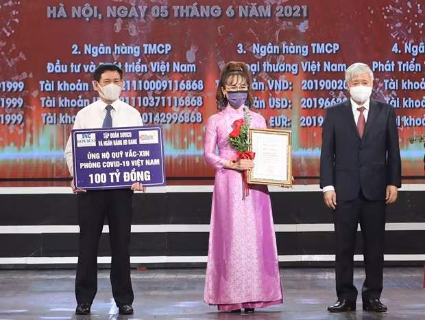 Vietnamitas se unen en lucha contra el COVID-19 ảnh 2
