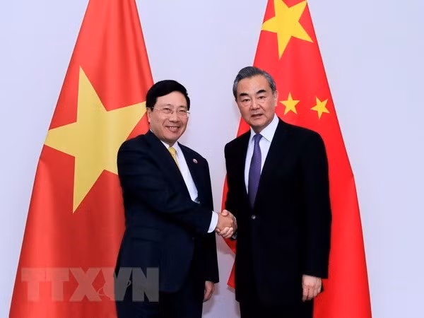 Ministros de Relaciones Exteriores de Vietnam y China se reúnen en Vientiane ảnh 1