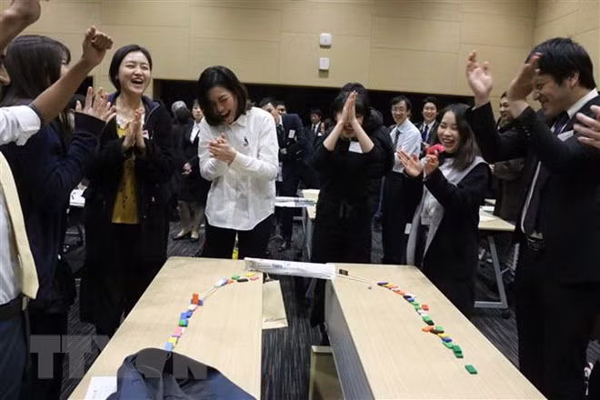 Estudiantes vietnamitas asisten a programa de intercambio con empresas japonesas ảnh 1