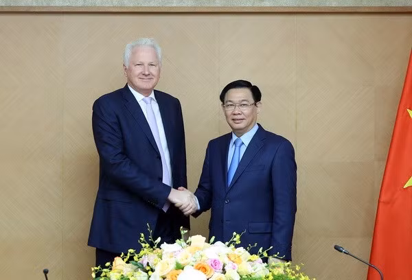 Proponen a grupo singapurense intercambiar experiencias con Vietnam en banco digital ảnh 1
