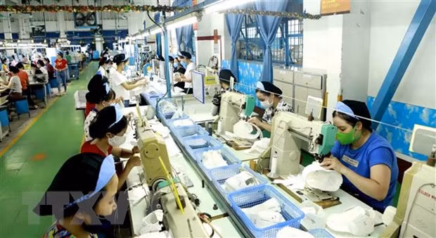 Empresas vietnamitas optimistas sobre las perspectivas de negocios en 2022 ảnh 1