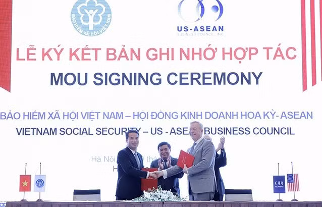 Firman Vietnam y Estados Unidos acuerdo de cooperación en seguros de salud ảnh 2