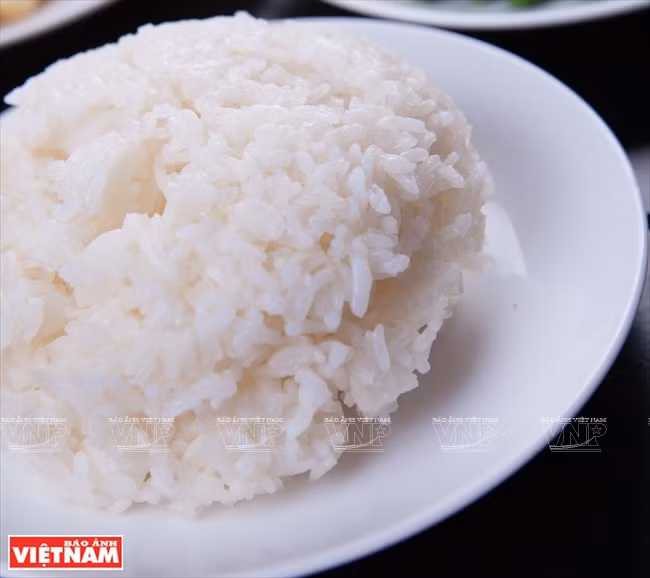 Arroz cocido al vapor con semillas de loto ảnh 3