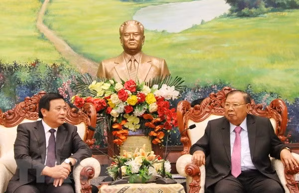Solicita Laos a Vietnam intensificar apoyo a los estudios teóricos y científicos ảnh 1