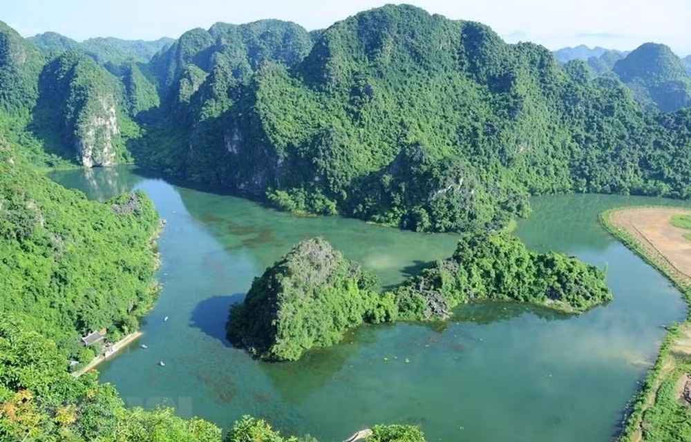 Armonizan la conservación y el desarrollo del patrimonio cultural de Trang An ảnh 1