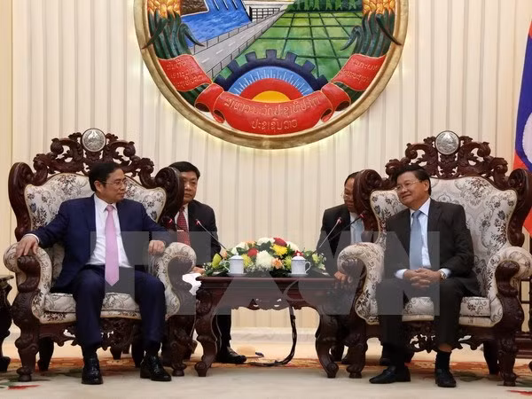 Firman Vietnam y Laos acuerdo de cooperación partidista ảnh 1