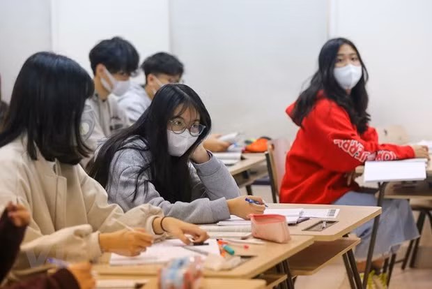 Determinan condiciones para el regreso a la escuela de los estudiantes vietnamitas ảnh 1