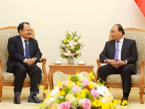 Premier vietnamita recibe al ministro de Energía y Minas de Laos ảnh 1