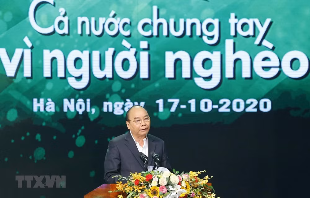 Reducción de la pobreza en Vietnam es una misión clave, según el premier ảnh 1
