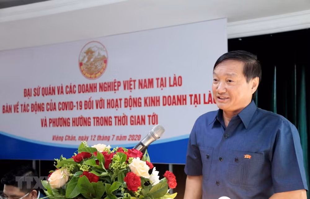 Empresas vietnamitas en Laos buscan solucionar dificultades provocadas por el COVID-19 ảnh 1