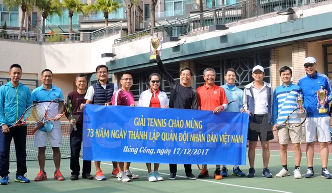 Efectúan actividades deportivas en Hong Kong (China) en saludo a la fundación del Ejército Popular vietnamita ảnh 1
