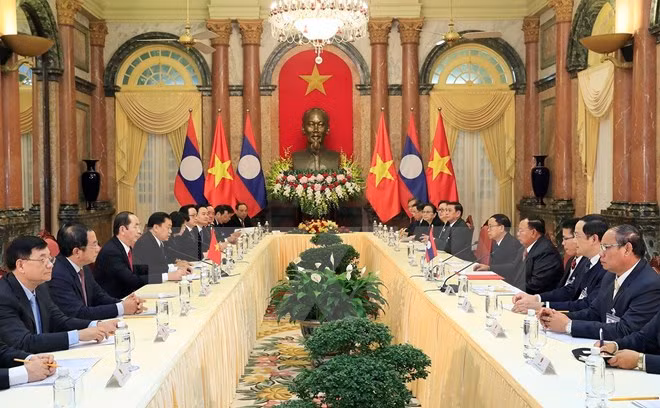 Presidente de Vietnam recibe a secretario general de PPRL y presidente de Laos ảnh 1