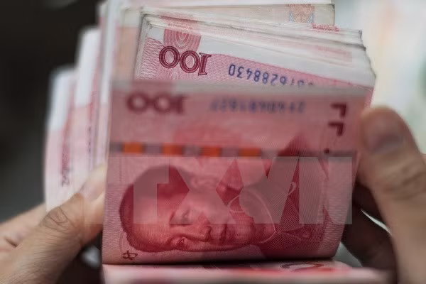 Ingreso de yuan chino a cesta de monedas de FMI no afecta inmediatamente a Vietnam ảnh 1