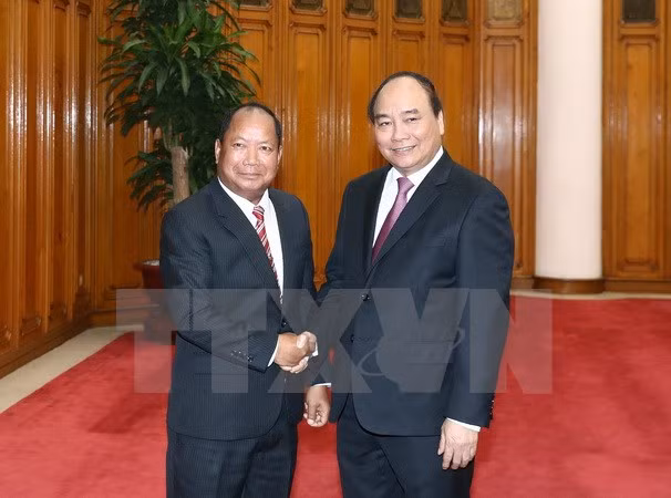 Premier vietnamita exhorta a mayor cooperación con Laos en seguridad pública ảnh 1