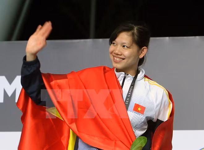 Vietnam mantiene segunda posición en medallero de SEA Games 29 ảnh 1