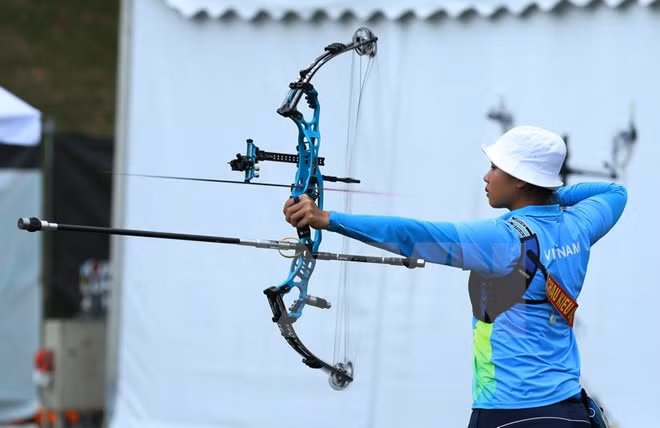 Tiro con arco de Vietnam obtiene segunda medalla en SEA Games 29 ảnh 1