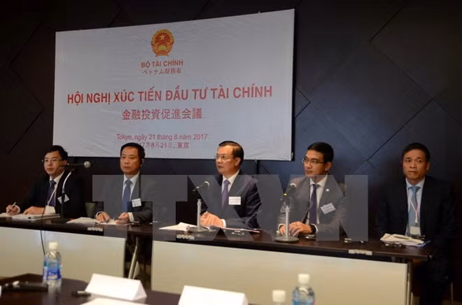Efectúan conferencia de promoción de inversión financiera de Japón en Vietnam ảnh 1