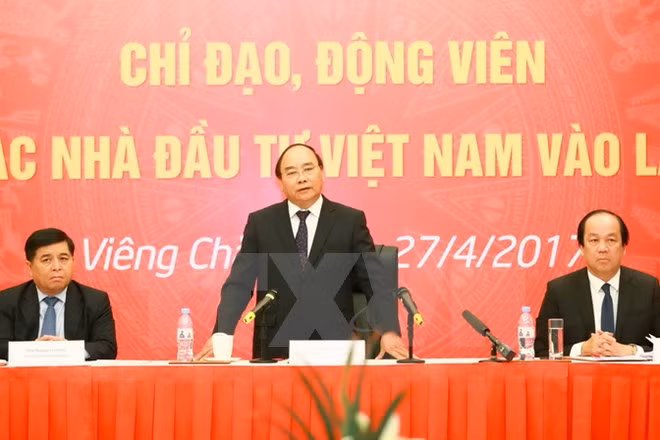 Primer ministro de Vietnam prosigue actividades en Laos ảnh 1