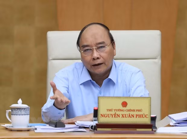 Premier vietnamita insta a sancionar manipulación de precios y acaparamiento de productos ảnh 1